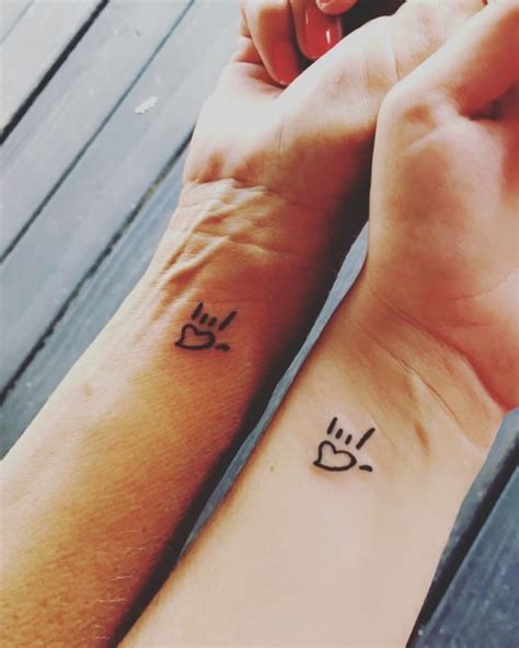 father daughter matching tattoo ideas